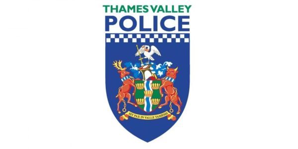 A crest of Thames Valley Police logo.